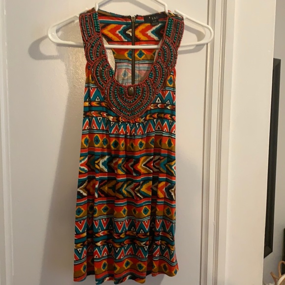 Colourful shirt with detailed beading. - Picture 1 of 5